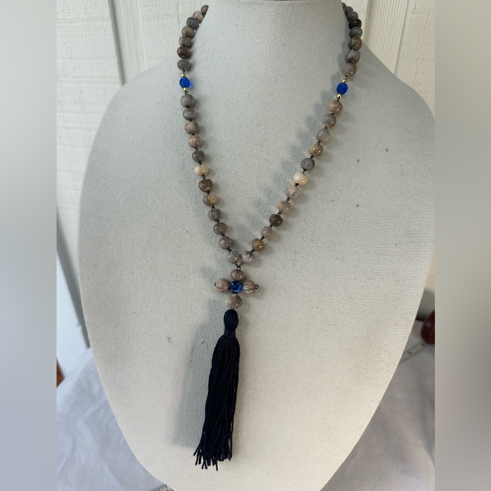 Interesting cross tassel necklace with the necklace made from nuts